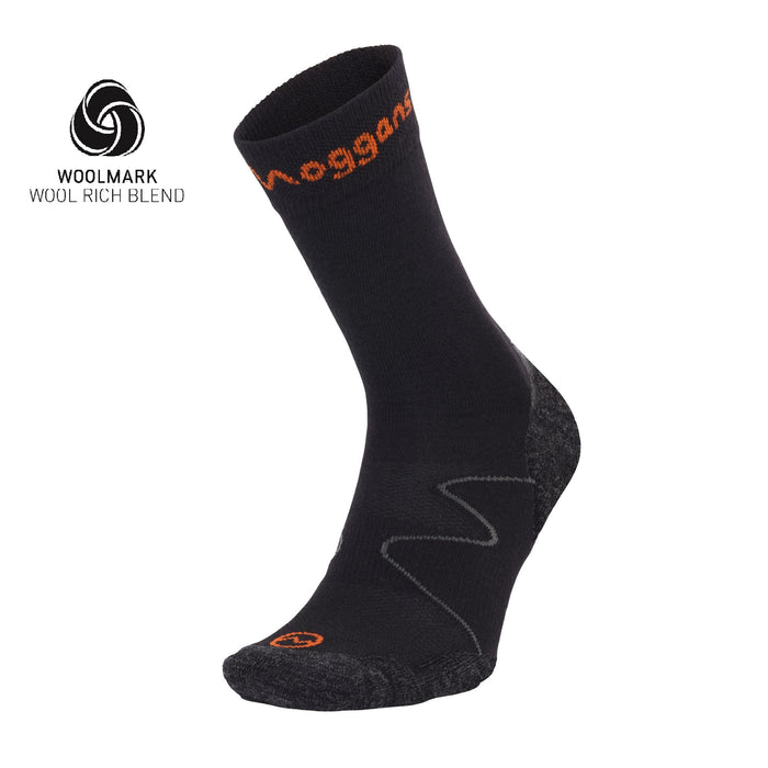 The black Moggans Ultralight Merino Crew Socks feature orange branding, a reinforced heel and toe, and a lightweight Merino Wool blend—ideal for trail runs. The Woolmark Wool Rich Blend logo appears in the top left.