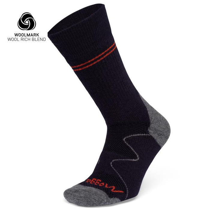 The Moggans Hiking Full Cushion Merino Crew Socks feature a dark blue and gray zigzag design with red accents, full cushioning, and a Woolmark-certified wool-rich blend for ultimate warmth and comfort in cold weather.
