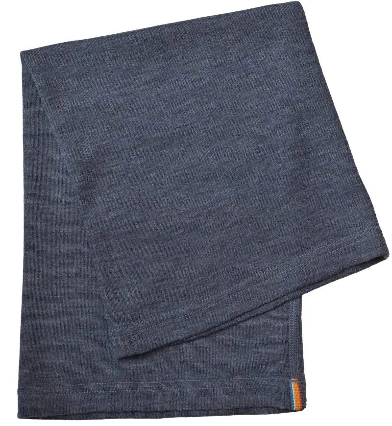 The Moggans Merino Wool Neck Gaiter with TENCEL™ Lyocell in dark gray features soft, lightweight fabric and a small orange and blue tag visible on one corner.