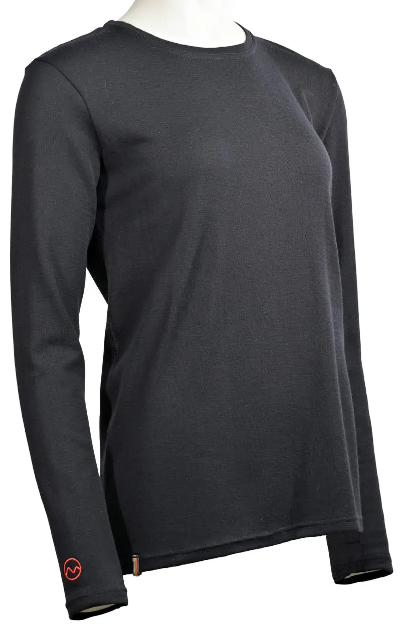 The Moggans 100% Merino Long Sleeve Baselayer—lightweight, thermoregulating, and sustainable—is shown in black on a headless mannequin, featuring a crew neck and a small red logo on the left cuff.