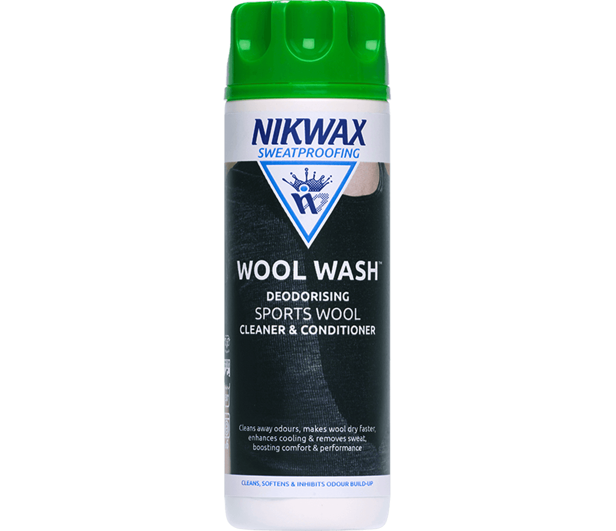 A 300ml bottle of Moggans Nikwax Wool Wash™ with a green cap and black-and-blue label, formulated to gently clean, deodorise, soften, and condition merino sportswear.