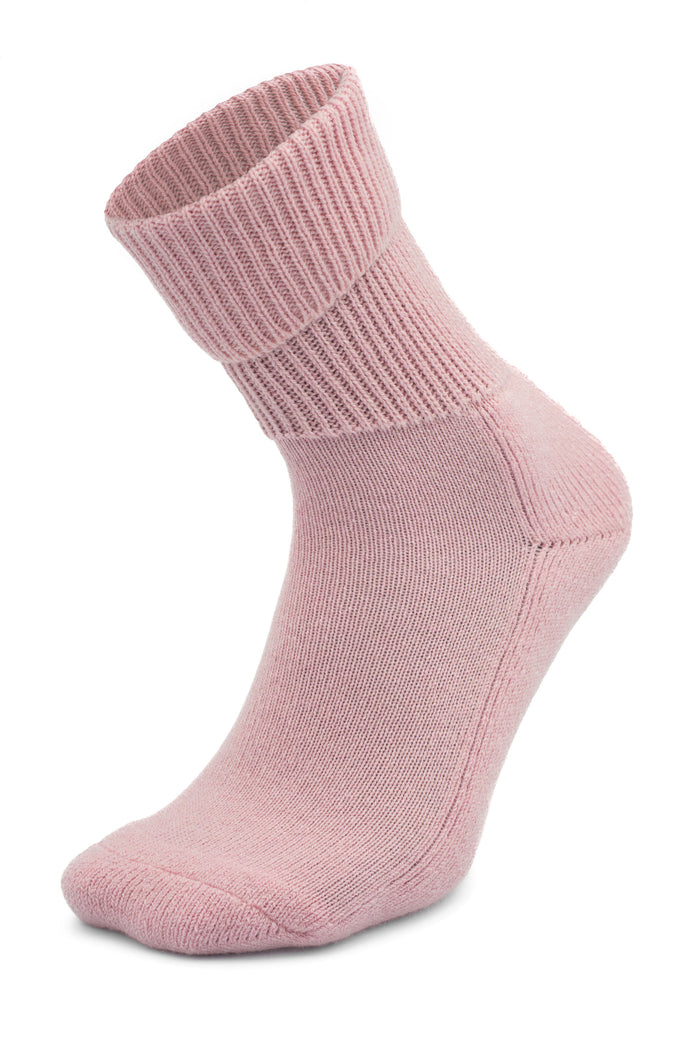 glamour pink, ribbed, crew-length Moggans Cashmere Luxury Bed Sock — made in Scotland — set against a white background.
