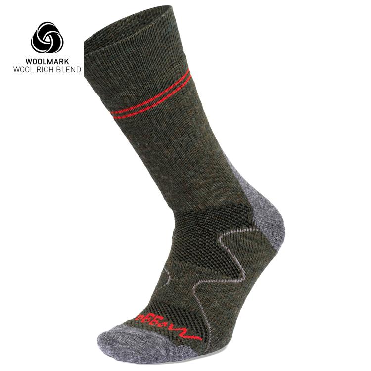 A single dark green and gray Moggans Hiking Full Cushion Merino Crew Sock with red accents is displayed upright. It features ribbed and textured sections for support and shows the Woolmark Wool Rich Blend logo in the top left corner.