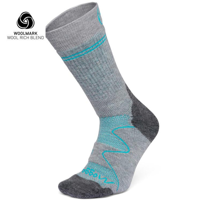 The Moggans Hiking Full Cushion Merino Crew Sock is gray with turquoise accents, a dark gray heel and toe, and features the Woolmark logo—ideal for cold weather thanks to its wool-rich Merino material.