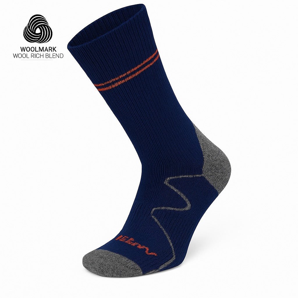 The Moggans Hiking Full Cushion Merino Crew Sock features dark blue and gray colors, red stripes at the top, red toe lettering, and the Woolmark logo—perfect for cold weather comfort and quality.