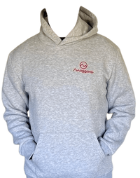 A person wears the Moggans Hoodie – Soft, Warm & Sustainable in light gray, featuring a small red Moggans logo and emblem on the left chest. Hands are in the front pocket against a plain white background.
