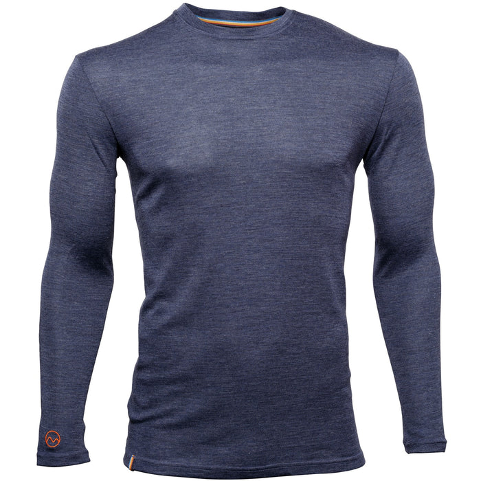 The Men's Moggans Merino Long Sleeve Baselayer with TENCEL™ is a slim fit, heathered navy crew neck shirt with a small orange logo by the left wrist, made from a sustainable and thermoregulating TENCEL™ Lyocell blend.