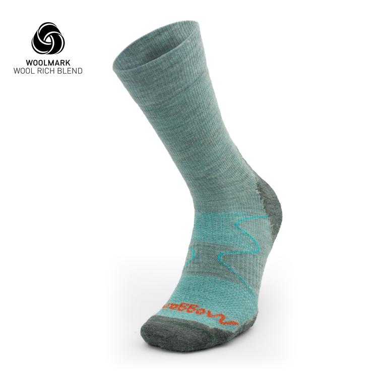The Moggans Hiking Midweight Merino Crew Sock features light gray and teal colors, a zigzag pattern, orange text, reinforced toe and heel, plus the Woolmark Wool Rich Blend logo—ideal for outdoor adventures.