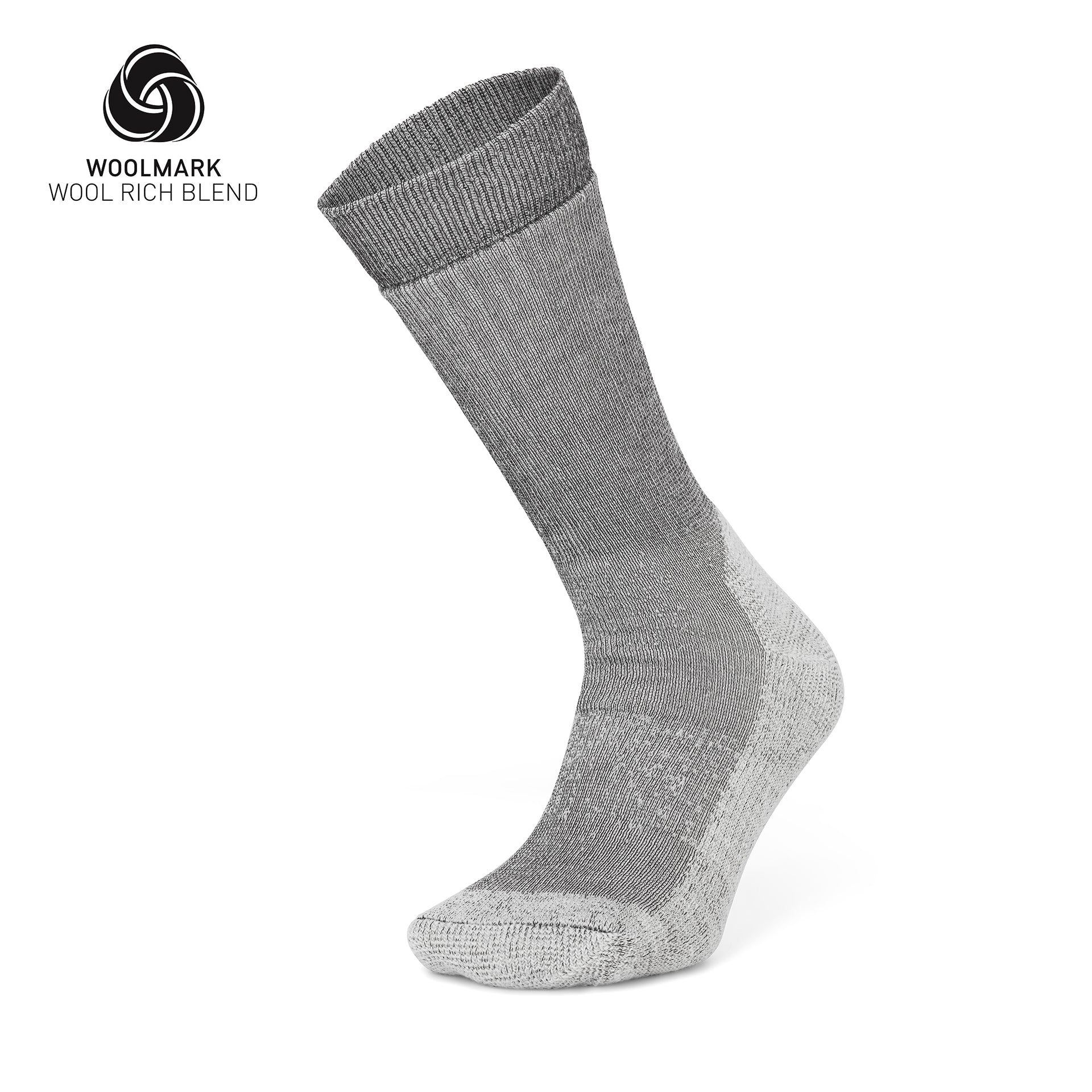 The Moggans Merino Hiking Socks - Stravaiger, made in Scotland, are gray wool-blend crew socks with lighter gray heel, toe, and sole. Displayed upright with Woolmark logo and “Wool Rich Blend” text—ideal for hiking.