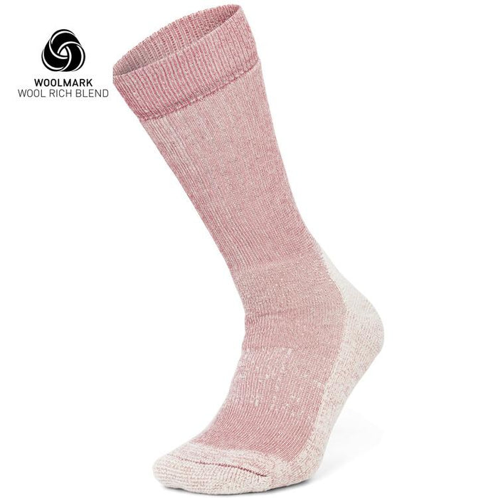 A single pink and white Moggans Stravaiger Merino Hiking Sock, with a ribbed cuff, is displayed upright on a white background. Woolmark and Wool Rich Blend logos appear in the top left. Made in Scotland, ideal for hiking.
