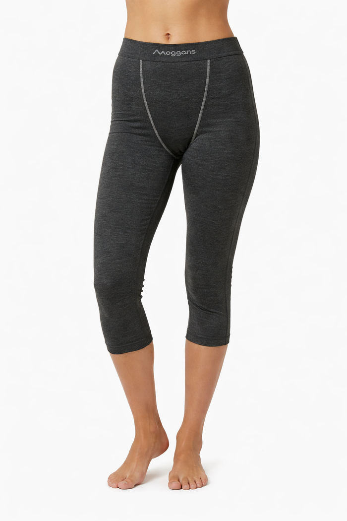 Women's Moggans Schiehallion 3/4 Merino Wool Leggings in charcoal grey, shown from the front. Seamless construction, thermoregulating 220gsm fabric for alpine skiing and cold-weather hiking.