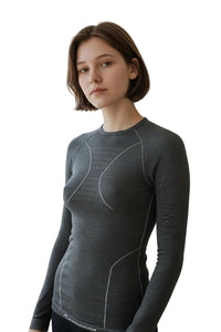 Women's Moggans Schiehallion Merino Wool Base Layer displayed front, showing crew neck and seamless design. Premium 56% mulesing-free Merino wool for skiing and mountaineering.
